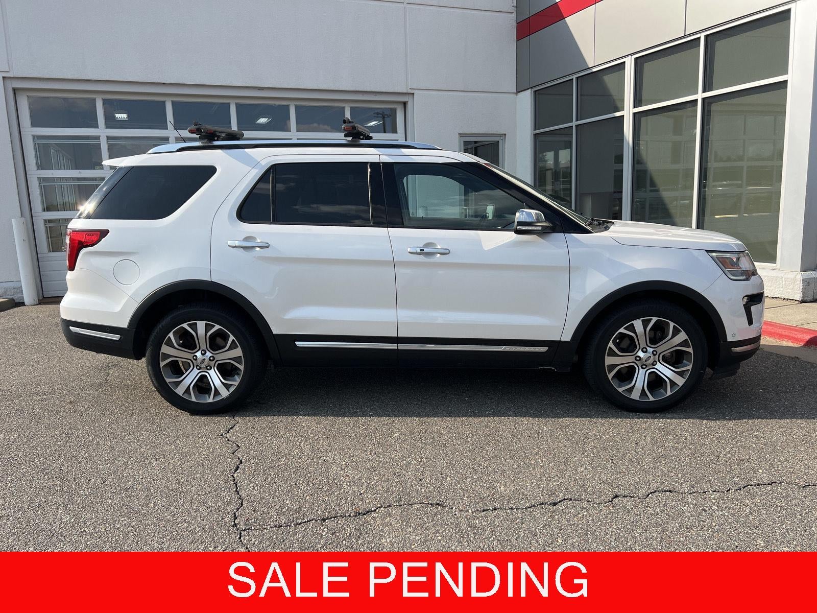 2018 Ford EXPLORER PLATINUM 4WD in White — front three-quarter view