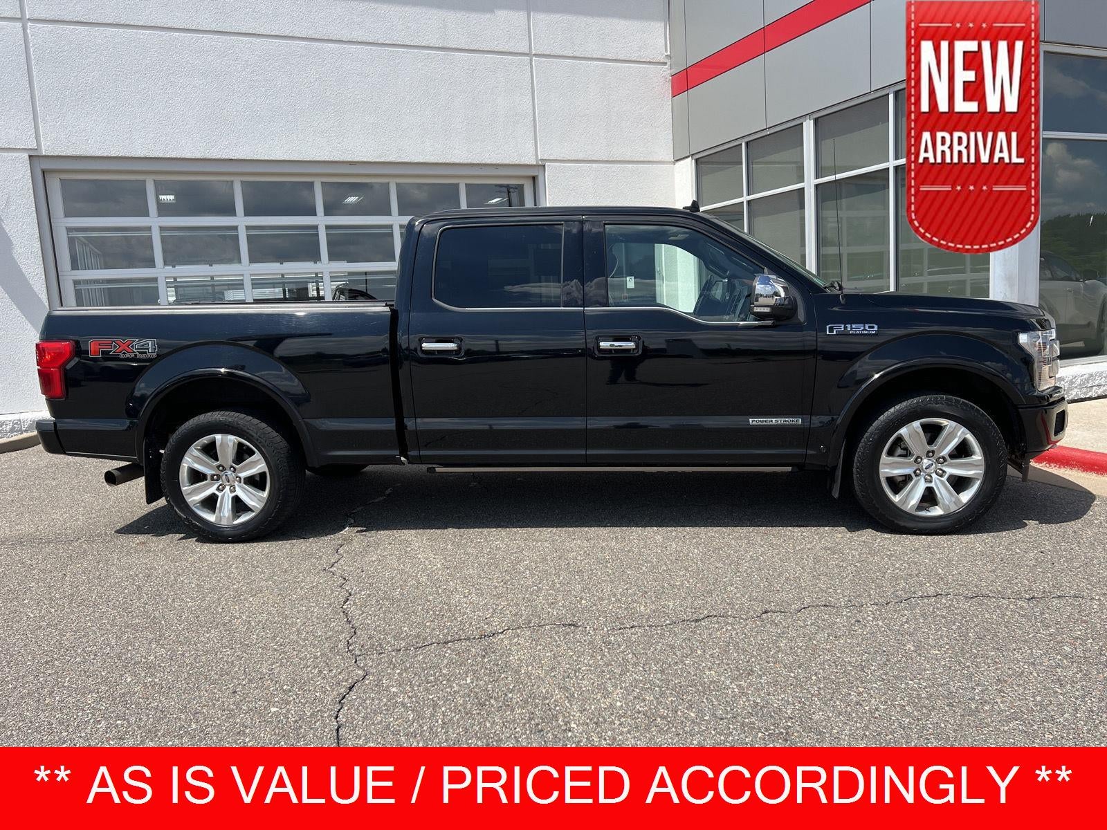 2018 Ford F-150 Platinum in Shadow Black — front three-quarter view