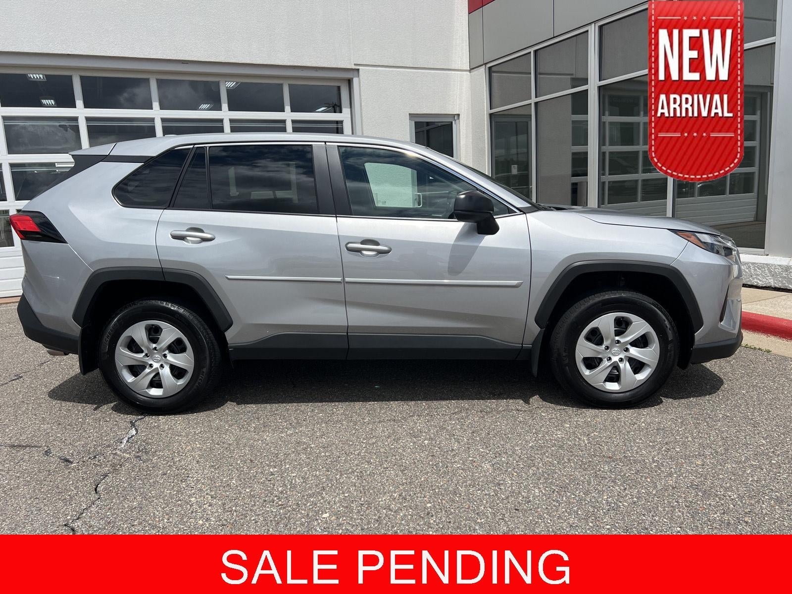 2023 Toyota RAV4 LE in Silver Sky Metallic — front three-quarter view