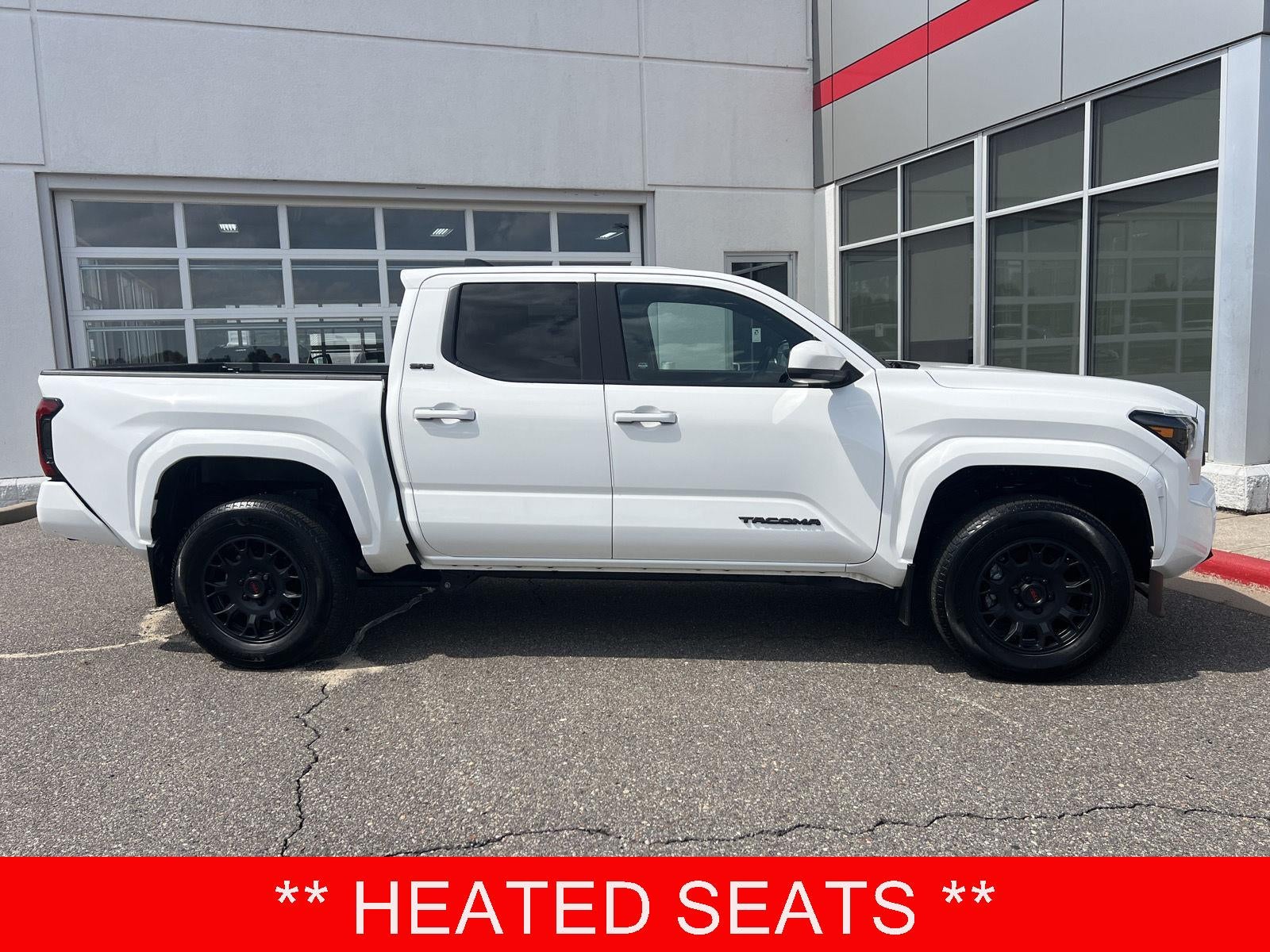2024 Toyota Tacoma SR5 in Ice Cap — front three-quarter view