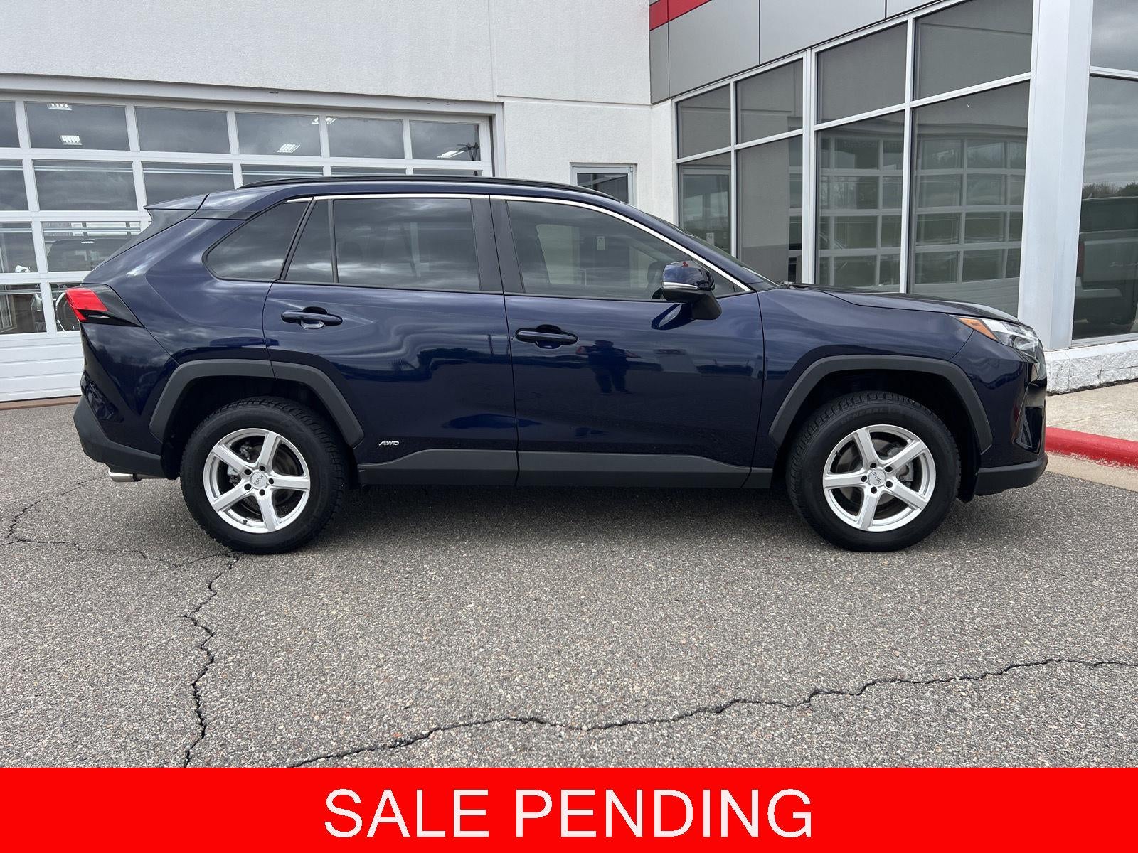 2023 Toyota RAV4 Hybrid XLE in Blueprint — front three-quarter view